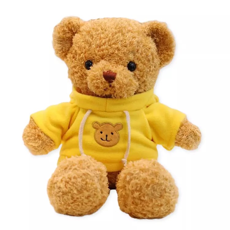 Плюшено мече със жълт пуловер